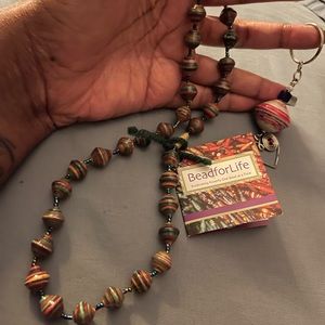 Beads for Life Necklace w/ colors of brown, green and other colors. w/ key chain